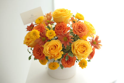 Citrus Bloom Serenade Celebrating Ceterpeice in Orange and Yellow