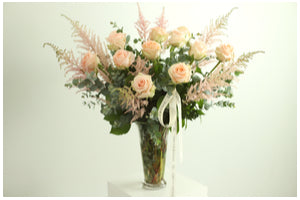 Deluxe Calming Rose and Astilbe Bouquet in a vase